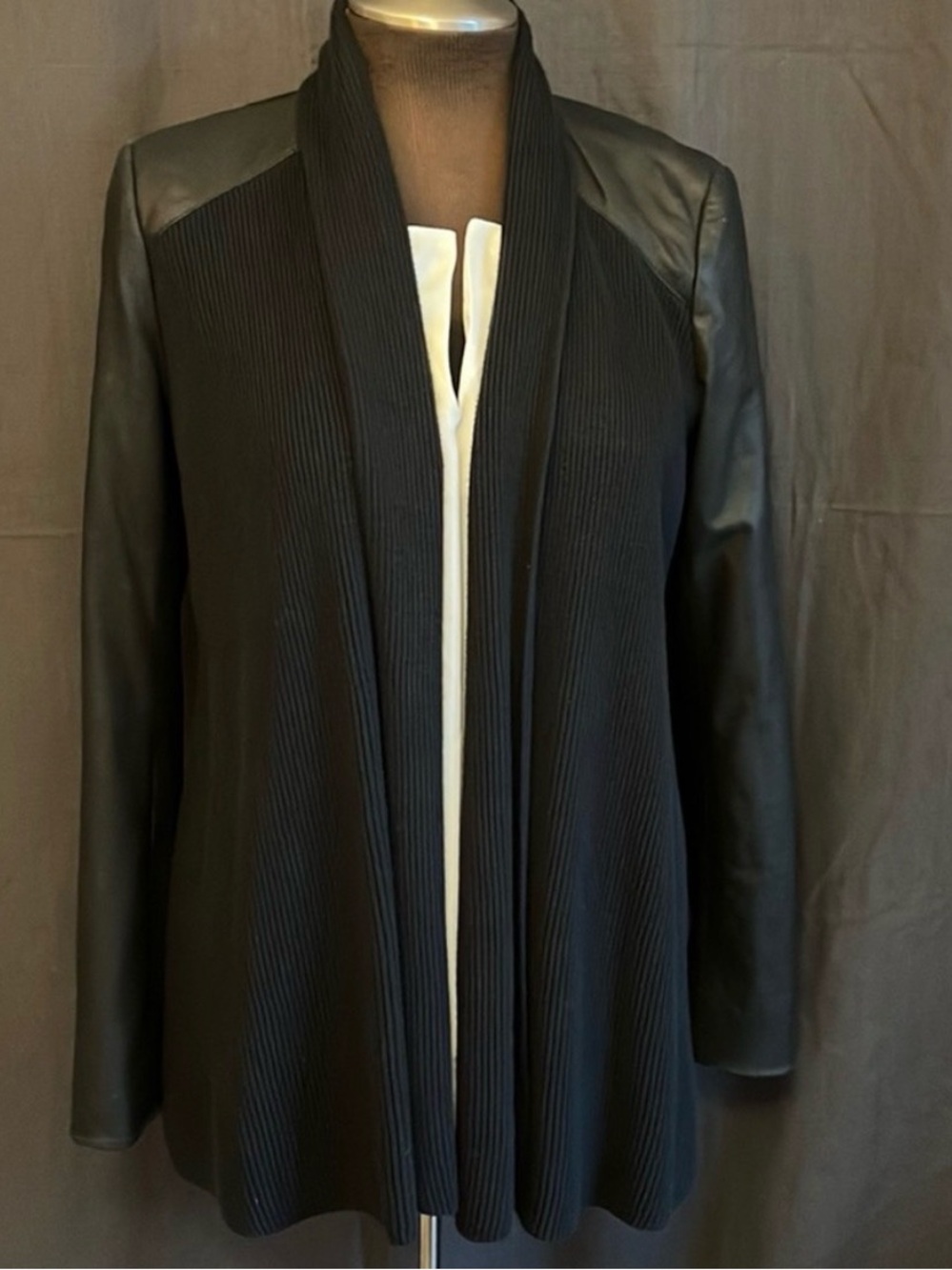 White House Black Market black leather and cotton blend jacket. Size Small.